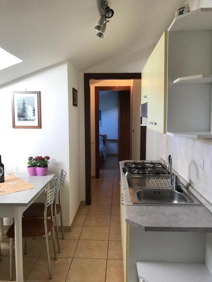 La Mansardina Apartment Porto Torres Bagian luar foto