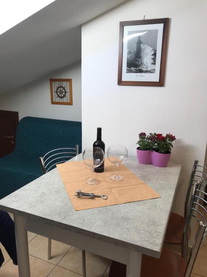 La Mansardina Apartment Porto Torres Bagian luar foto