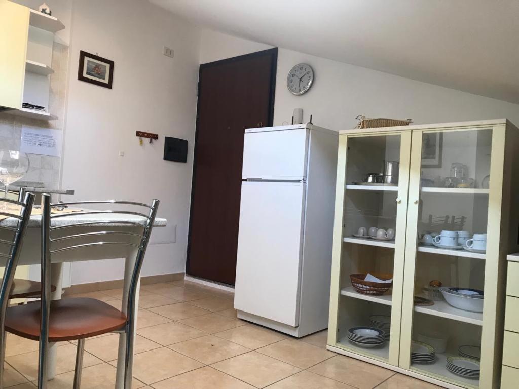 La Mansardina Apartment Porto Torres Bagian luar foto